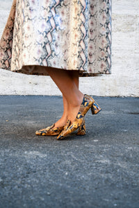 Pumps con Effetto Serpente Rochas